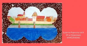 Na czerwonym tle umieszczono pracę plastyczną z podpisem "Zuzanna Paprocka lat 8 SP w Ostaszewie - wyróżnienie".