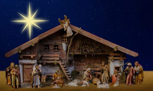 Grafika przedstawia szopkę z gwiazdą świecąca nad nią.